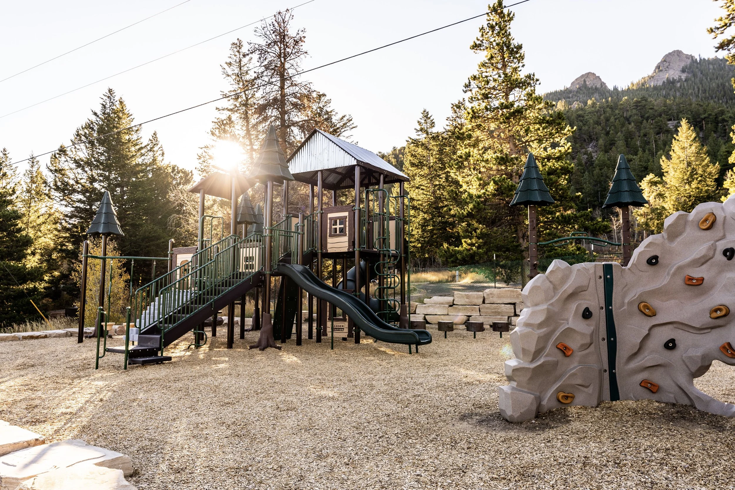 65commerical playground, mulch surfacing, playground photography playground, rock climber, slides.jpg