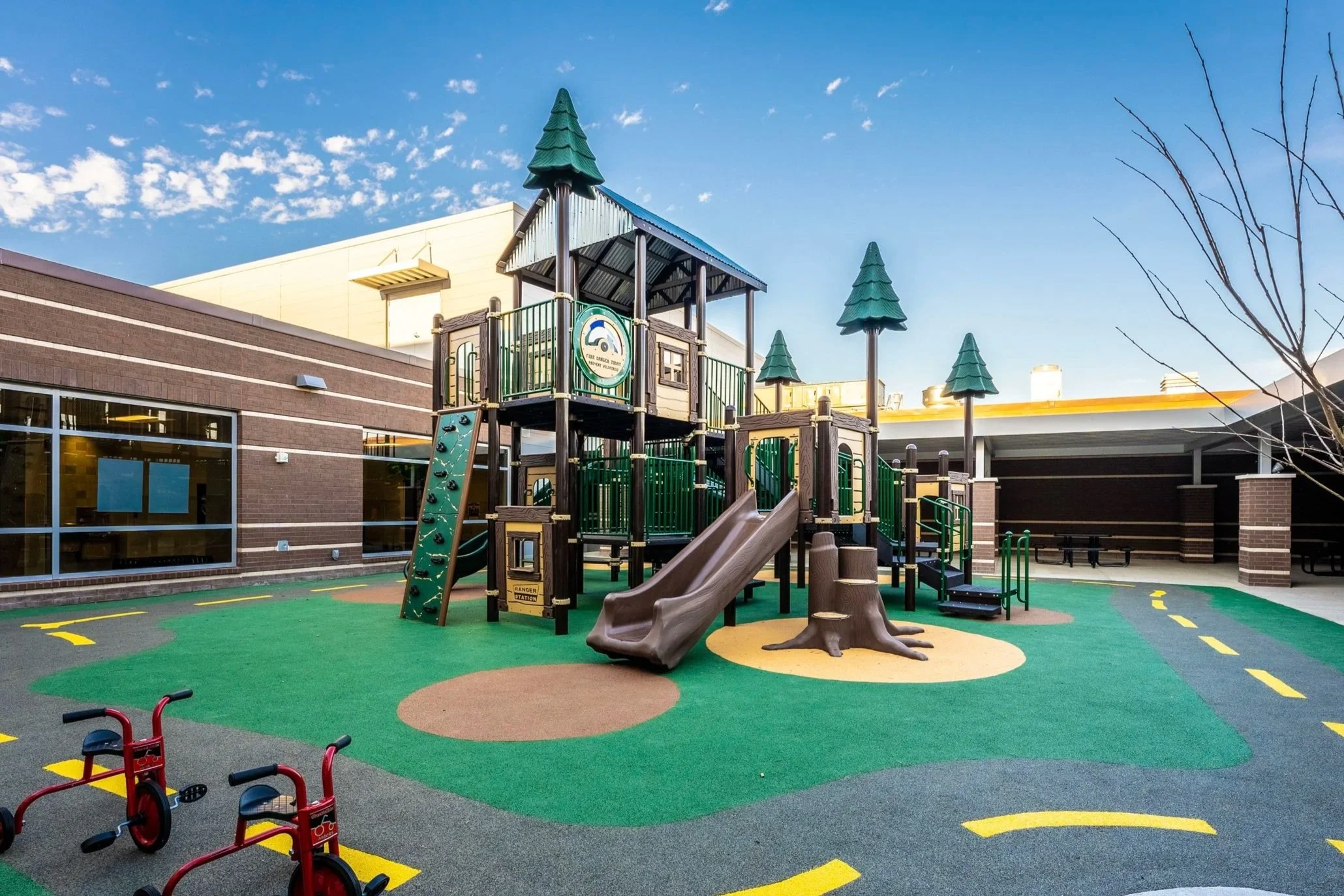13climbing+wall%2C+playground%2C+safety+surfacing%2C+slides%2C+toy+cars%2C+trees.jpg