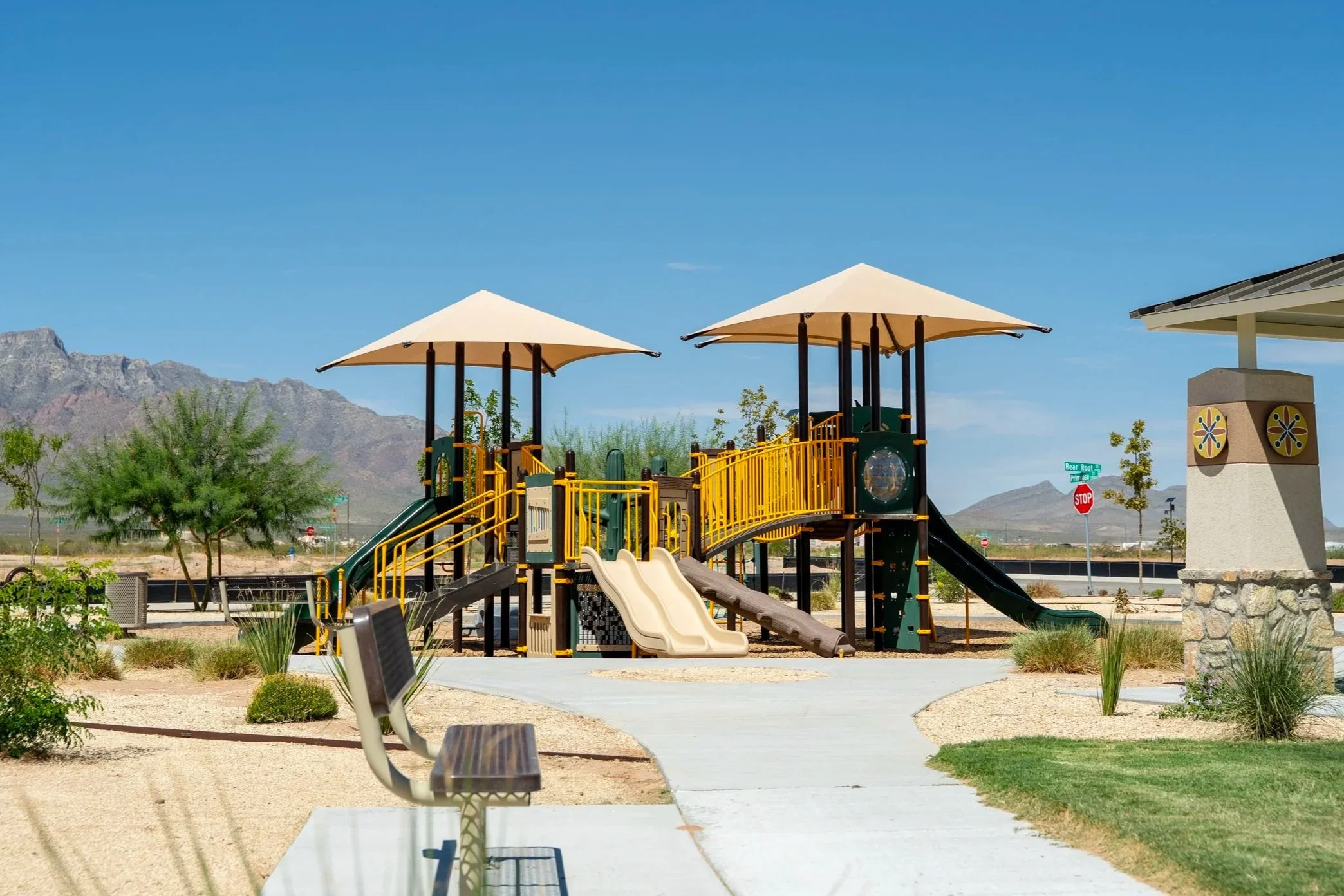 55close+up+of+playground+in+front+of+mountains%2C+commercial+playground%2C+playground+photography%2C+slides.jpg