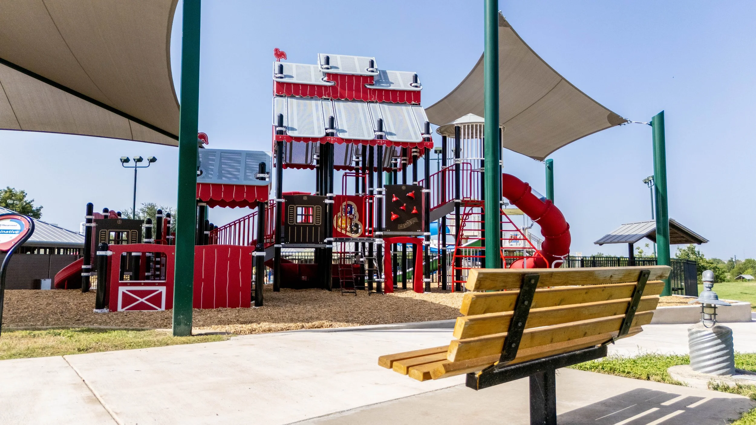49climber, commercial park, custom playground, mulch surfacing, multilevel playground, slides.jpg