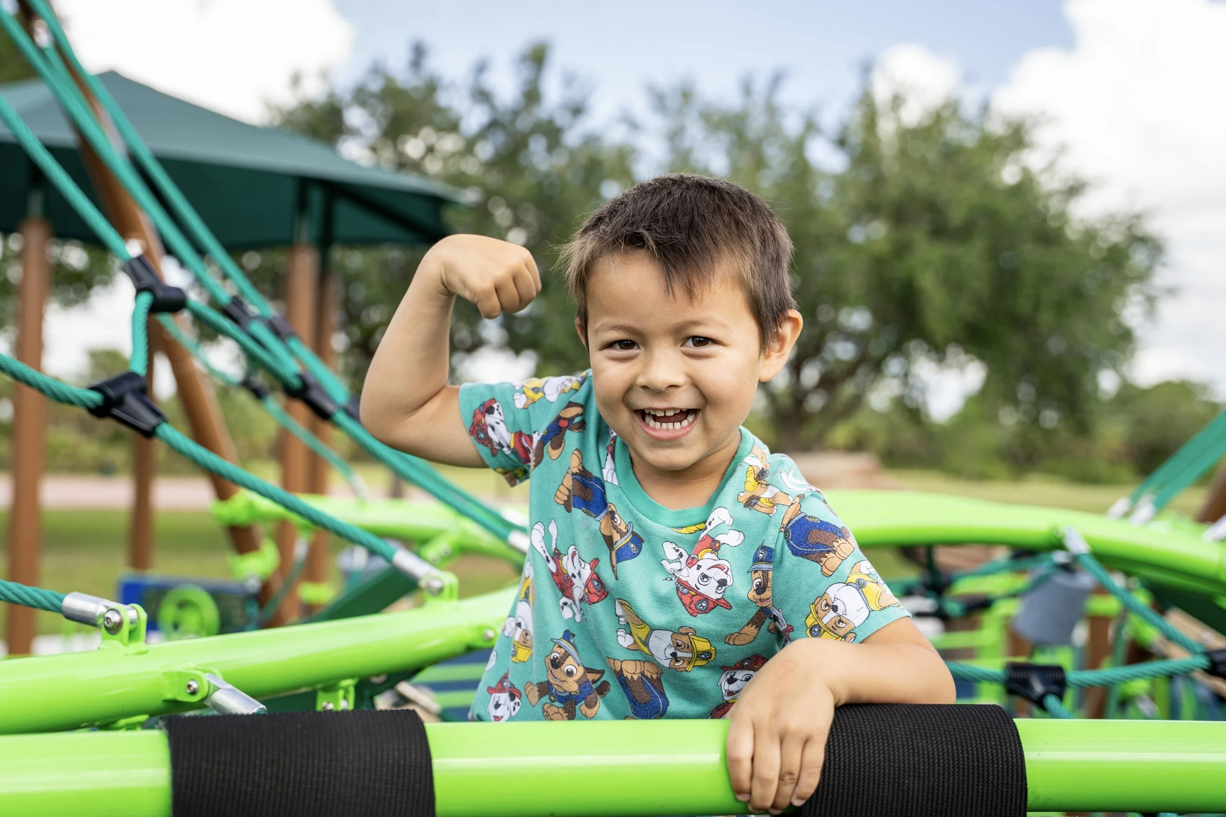 57boy playing on playground, climber, commercial playground, playground photography.jpg