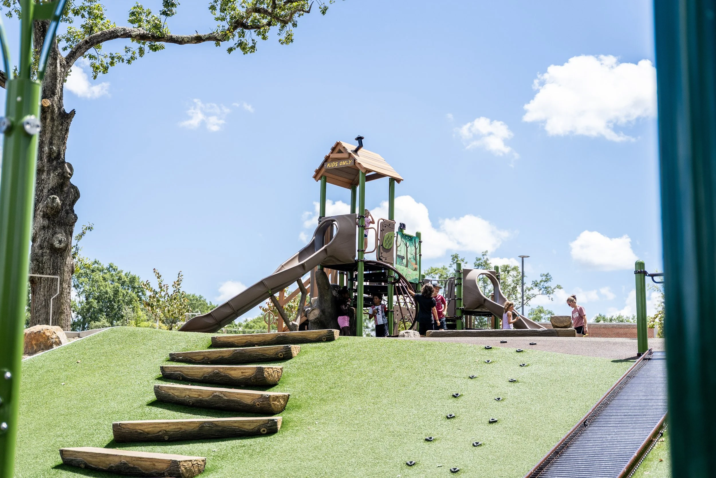 52artificial turf, commercial playground, concrete climbers, playground photography, slide, slides.jpg