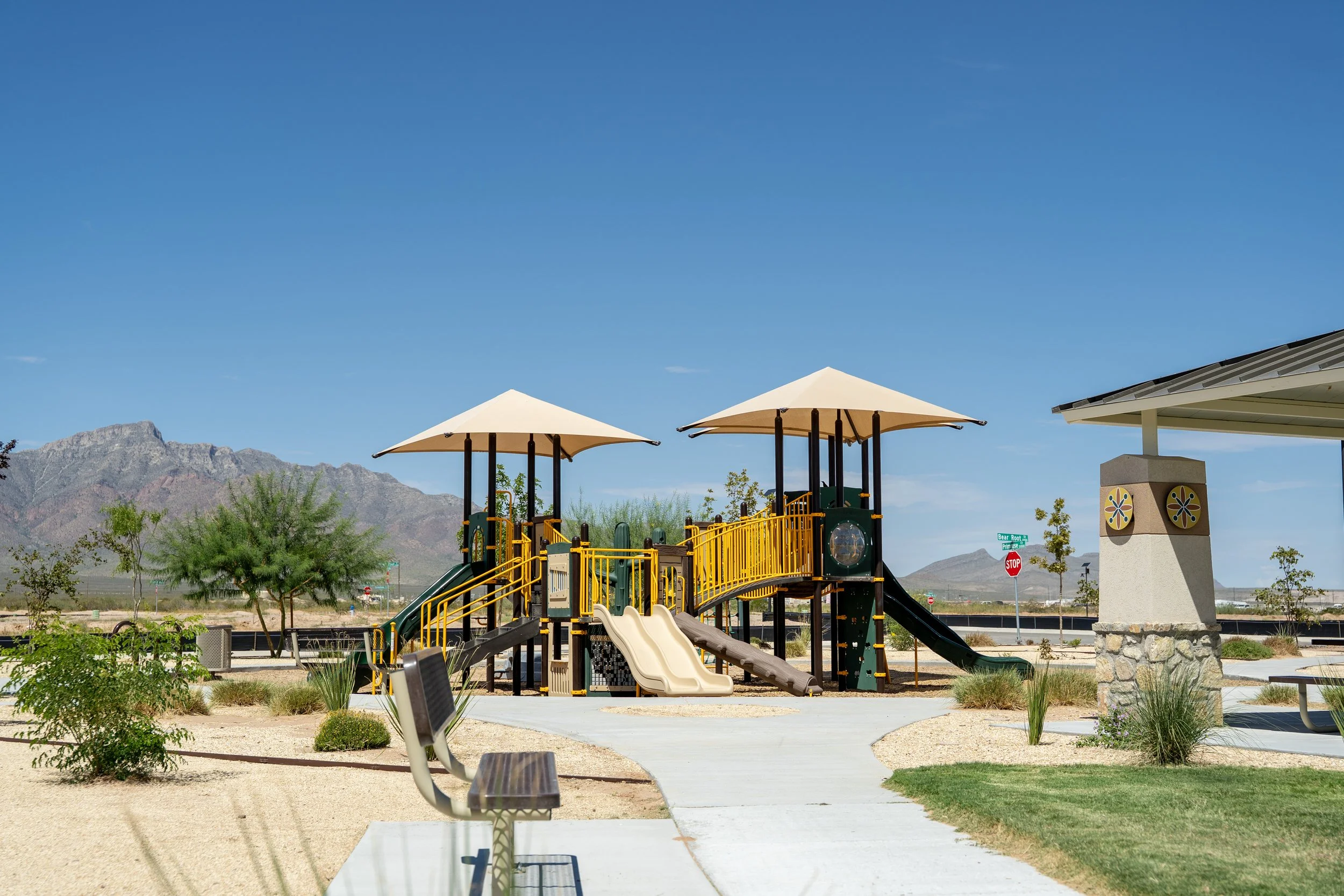 55close up of playground in front of mountains, commercial playground, playground photography, slides.jpg
