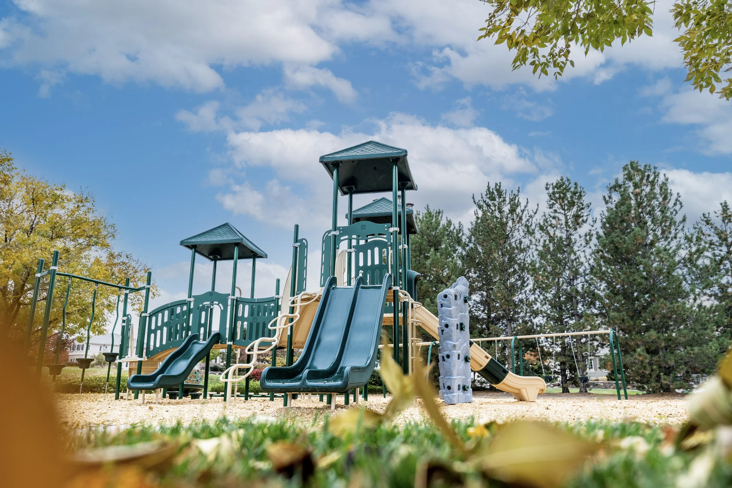 44climber, commercial park, custom playground, multilevel playground, slides, swings.jpg