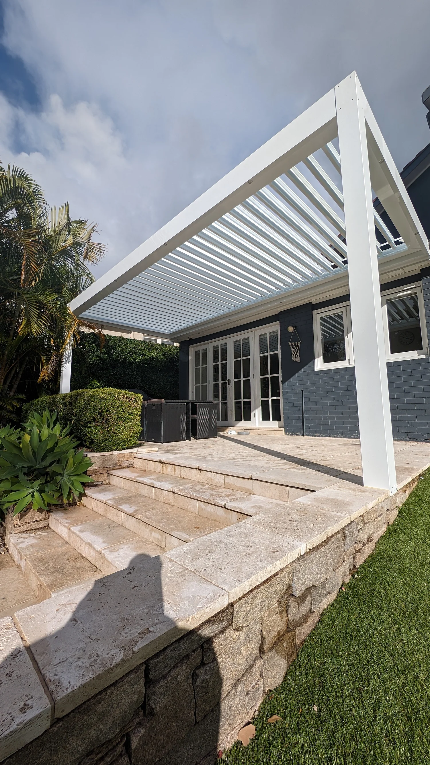 Completed GMC outdoor living installation with opening roof