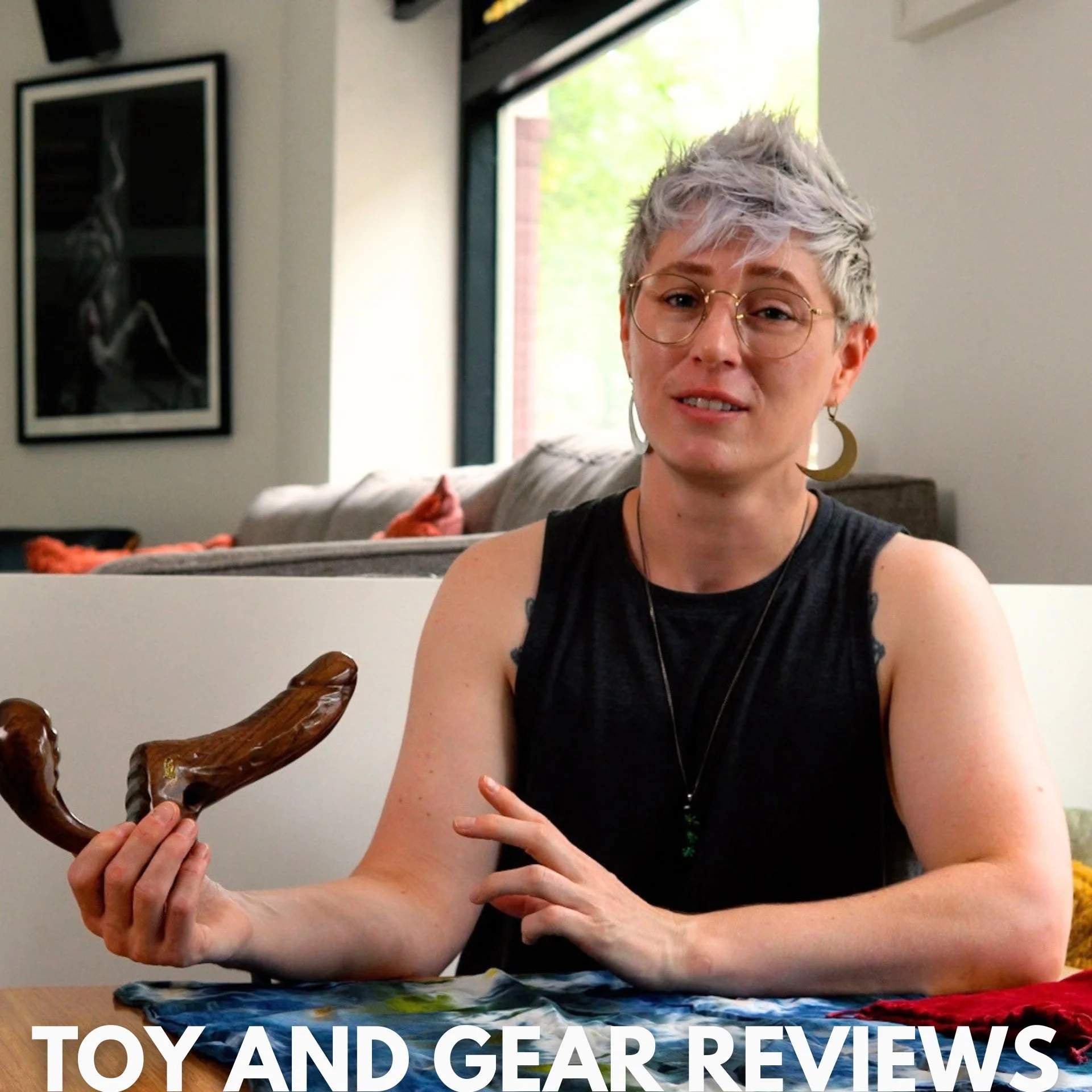 An image of Jaq Quicksilver holding the Sensual Desire Inmye, with the text "toy and gear reviews"