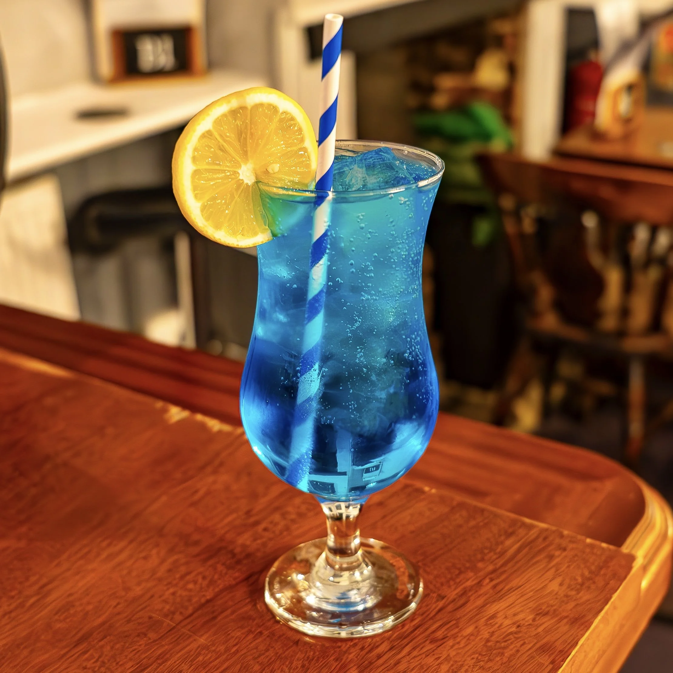 'Blue Lagoon' at the Walnut Tree, Loose - Blue Curaçao, vodka and lemonade. 