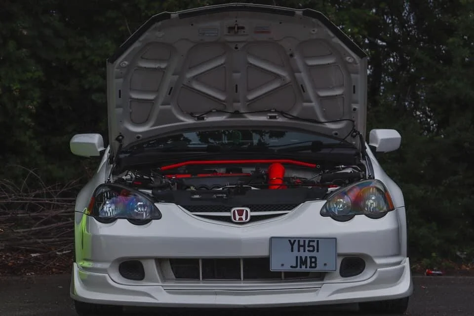 Modified white DC5 from the front with the bonnet up.jpeg
