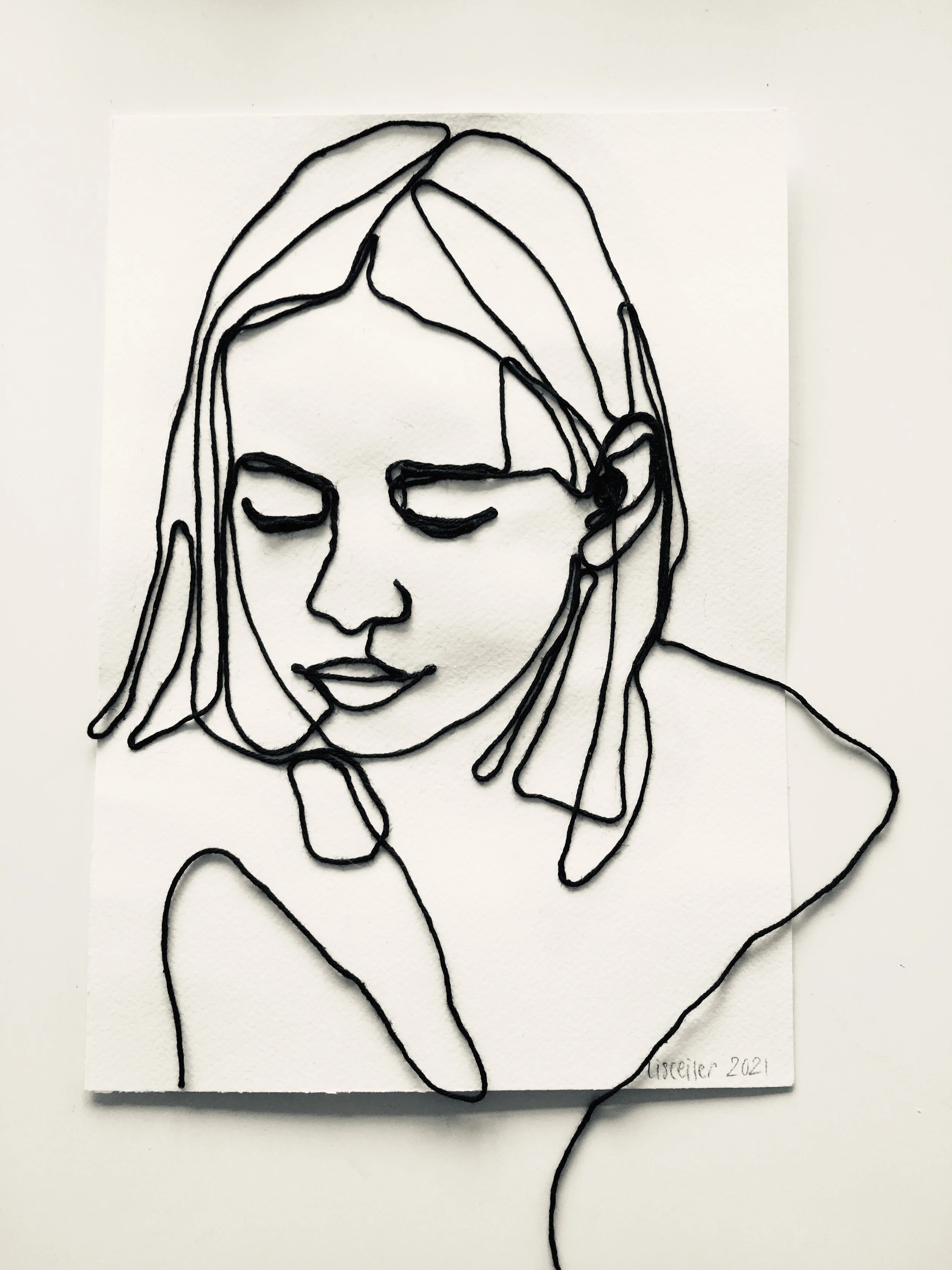 Frederikke, 2021,
snor på papir,
30 x 21 cm