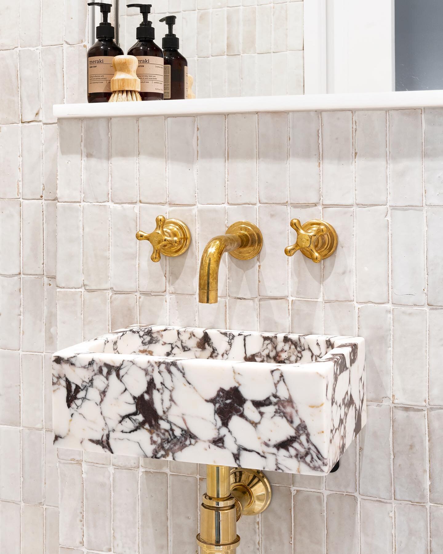 Bathroom details ✨this space is tiny so it was important to keep the finishes simple while still adding a touch of luxury. I love using materials that will age and patina over time. We used a custom made hand carved Calacatta Viola marble basin, raw 