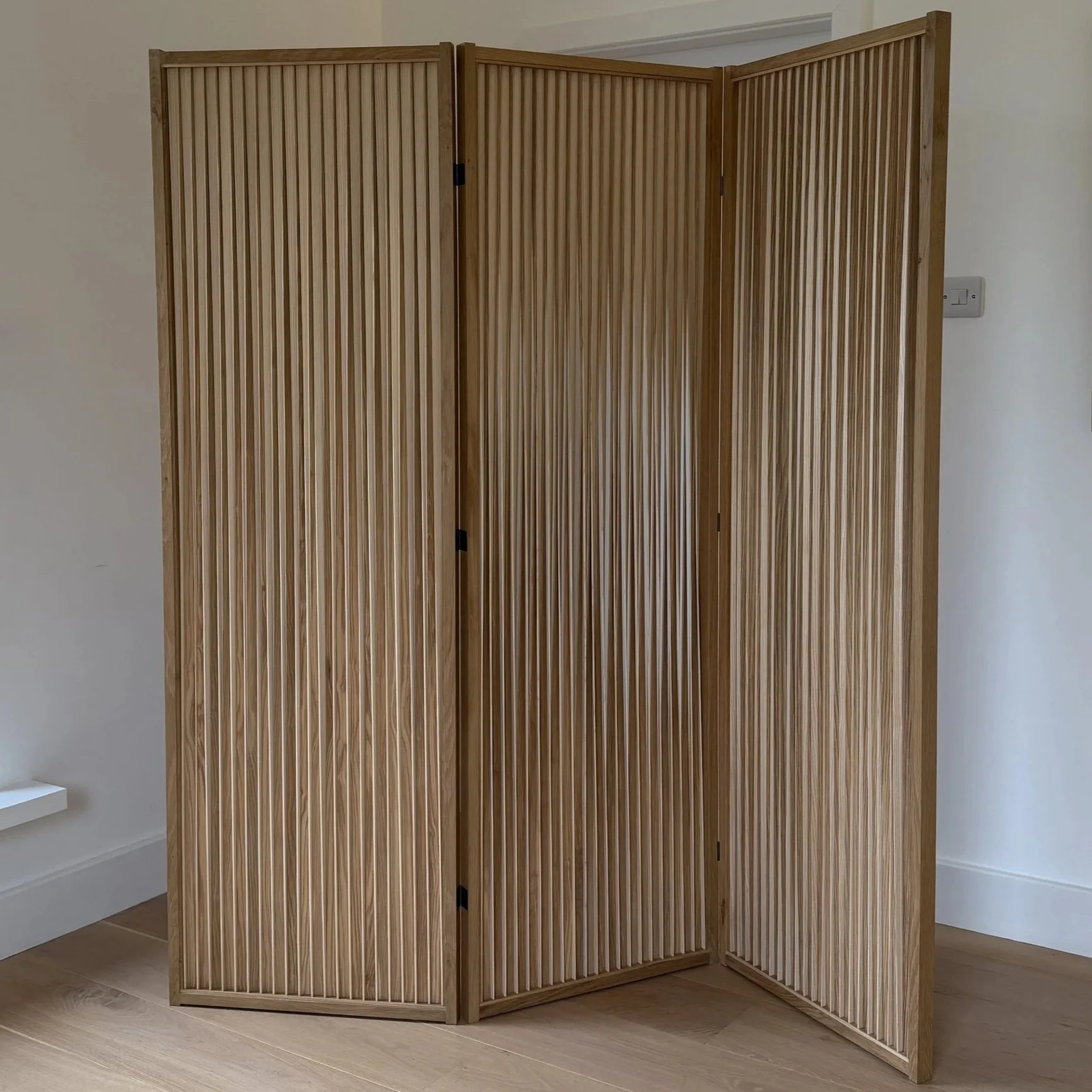 Katie Walker, Pin-stripe, 2025, English oak and English ash, 181 x 169.5 x 3.5 cm.