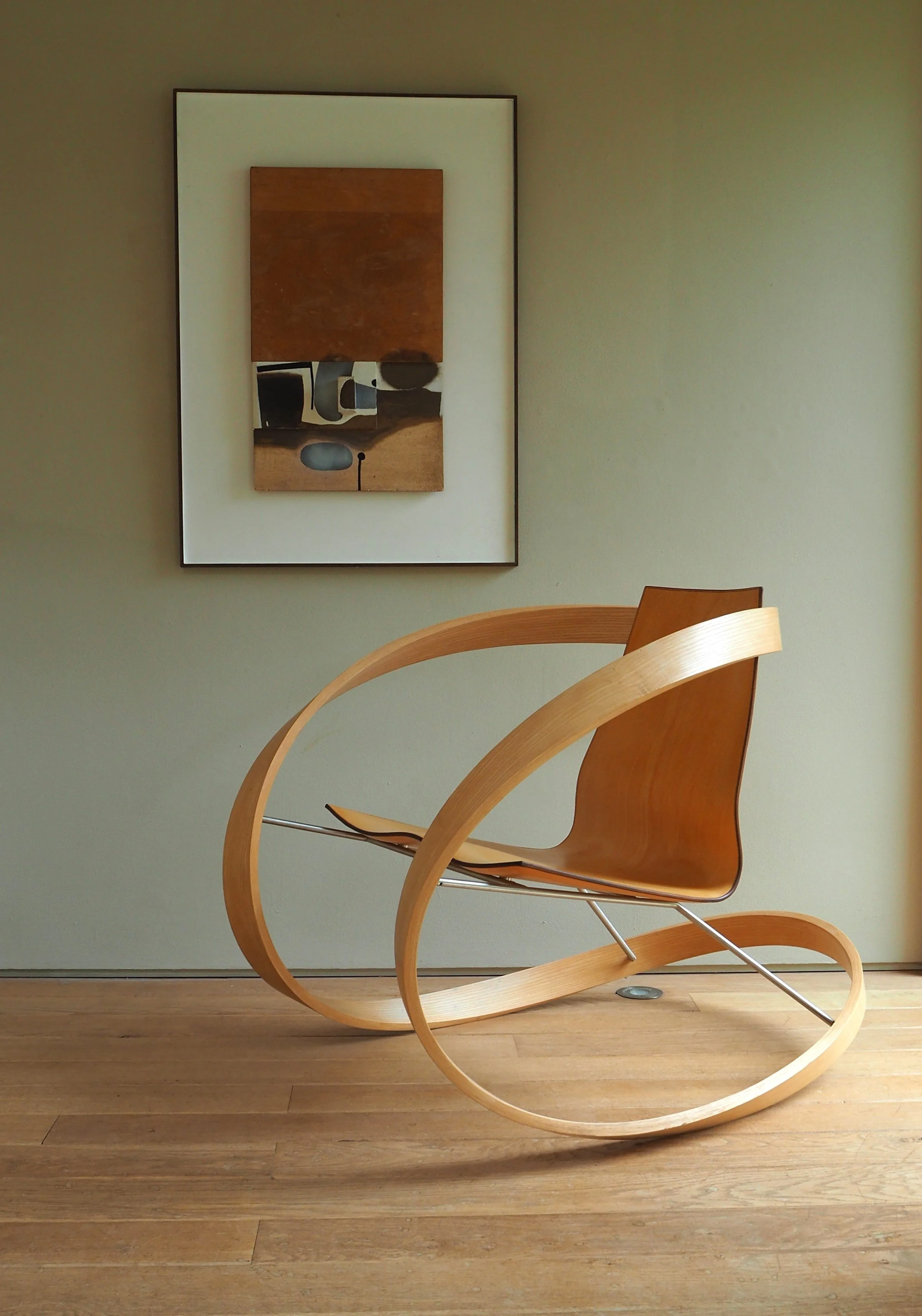 Katie Walker, Ribbon rocking chair, Designed 2006, Made 2018, Ash, brushed stainless steel and natural vegetable tanned saddle leather, 86 x 79 x 113 cm.