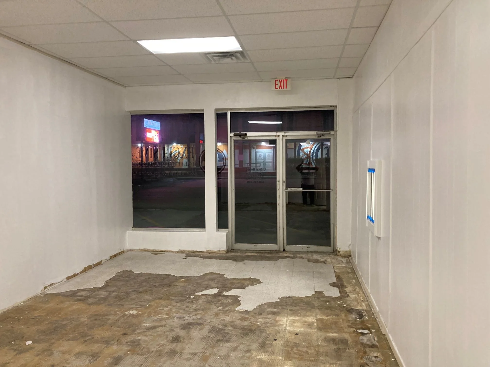 Beeville - B - final coat of paint in entry.jpg