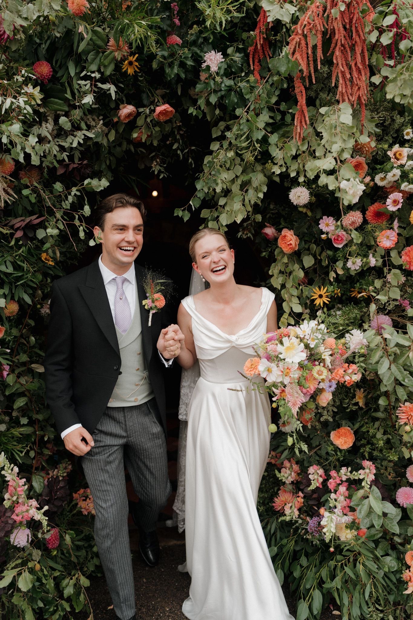 Happy couple exiting the Church 