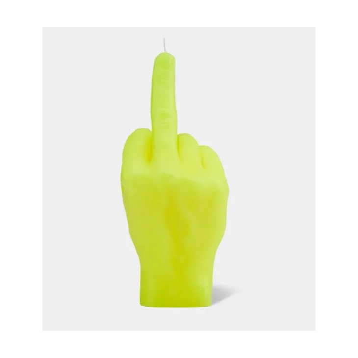 A yellow candle shaped like a hand making a middle finger gesture.