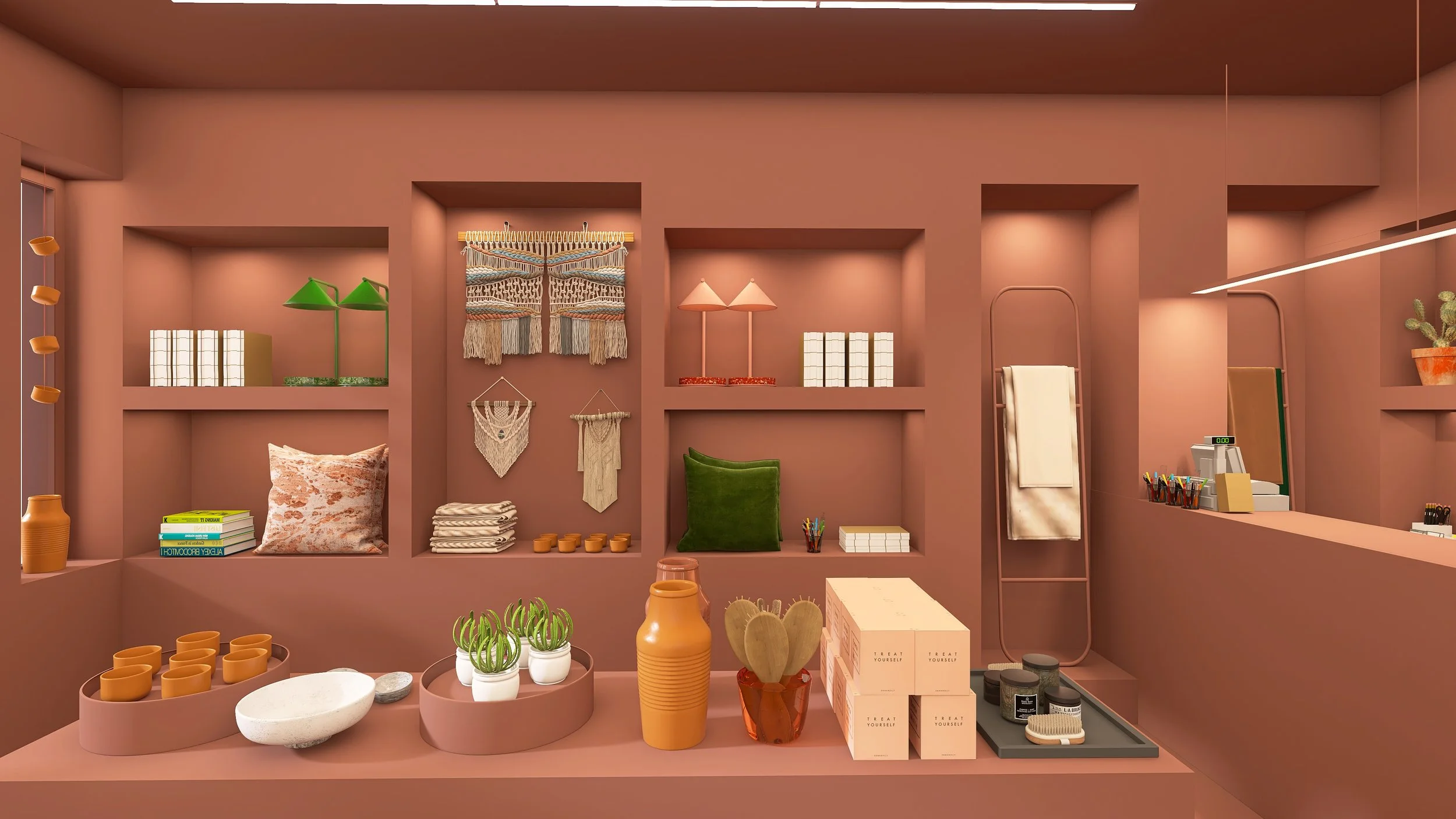 Interior de tienda con estanterías de color terracota, productos de cerámica, libros, cojines, toallas, macetas pequeñas, cajas y lámparas de mesa. The Cactus Shop, diseño de interiorismo y visual merchandising. Agosto Creative Studio.