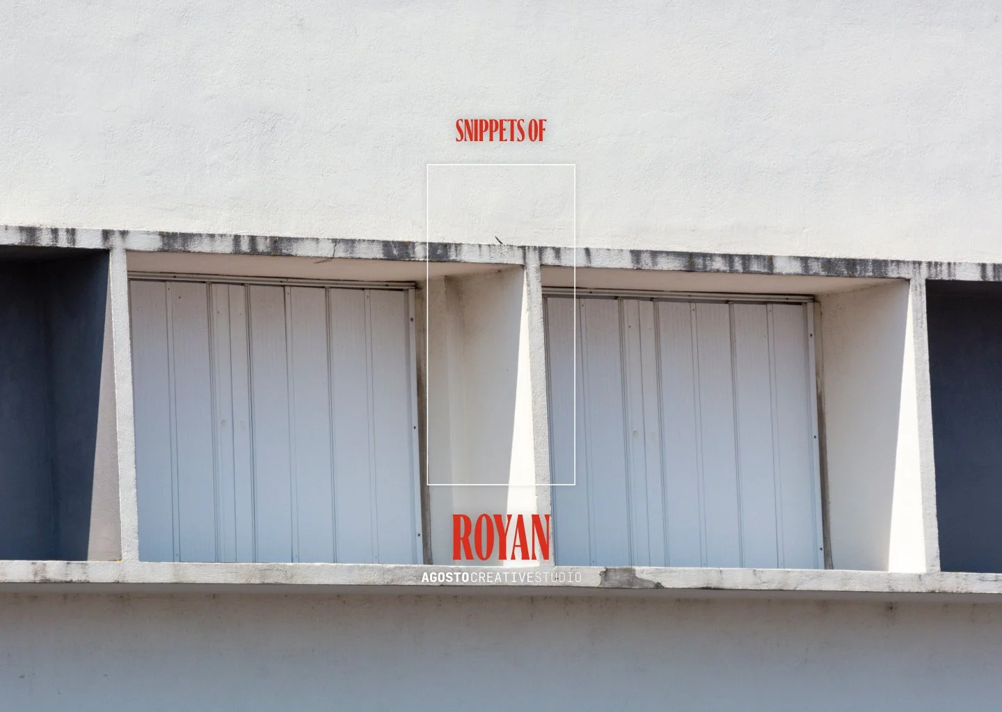 Fachada de un edificio con tres puertas de cochera de color gris y paredes blancas, y texto en rojo que dice "SNIPPETS OF" en la parte superior y "ROYAN" en la parte inferior.