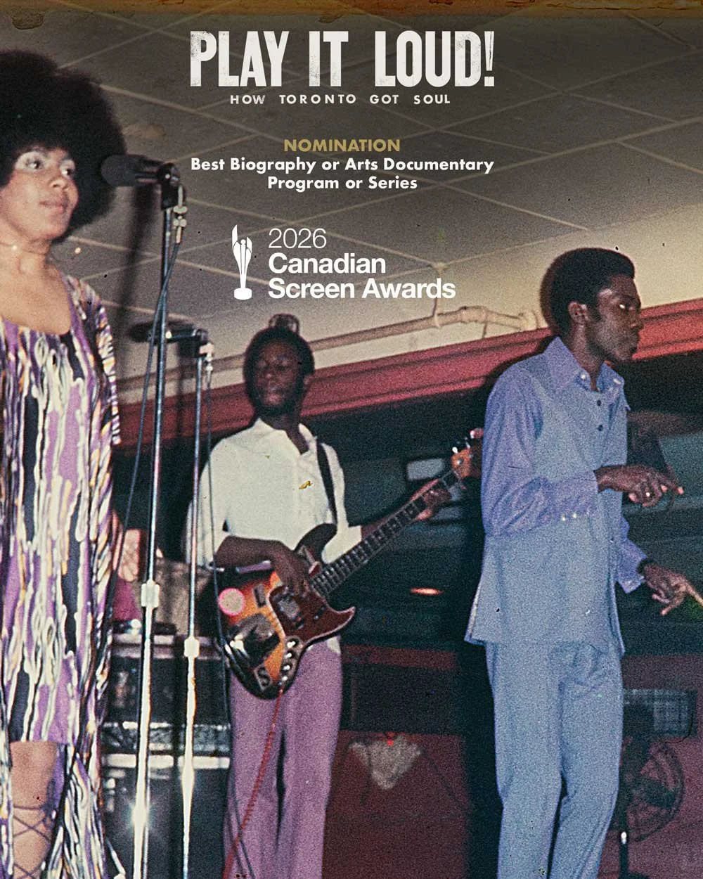 Archival image of a group of musicians performing on stage - a woman singing into a mic, and a man playing guitar, with promotional text about the "Play it Loud!" documentary film being nominated for a 2026 Canadian Screen Awards.