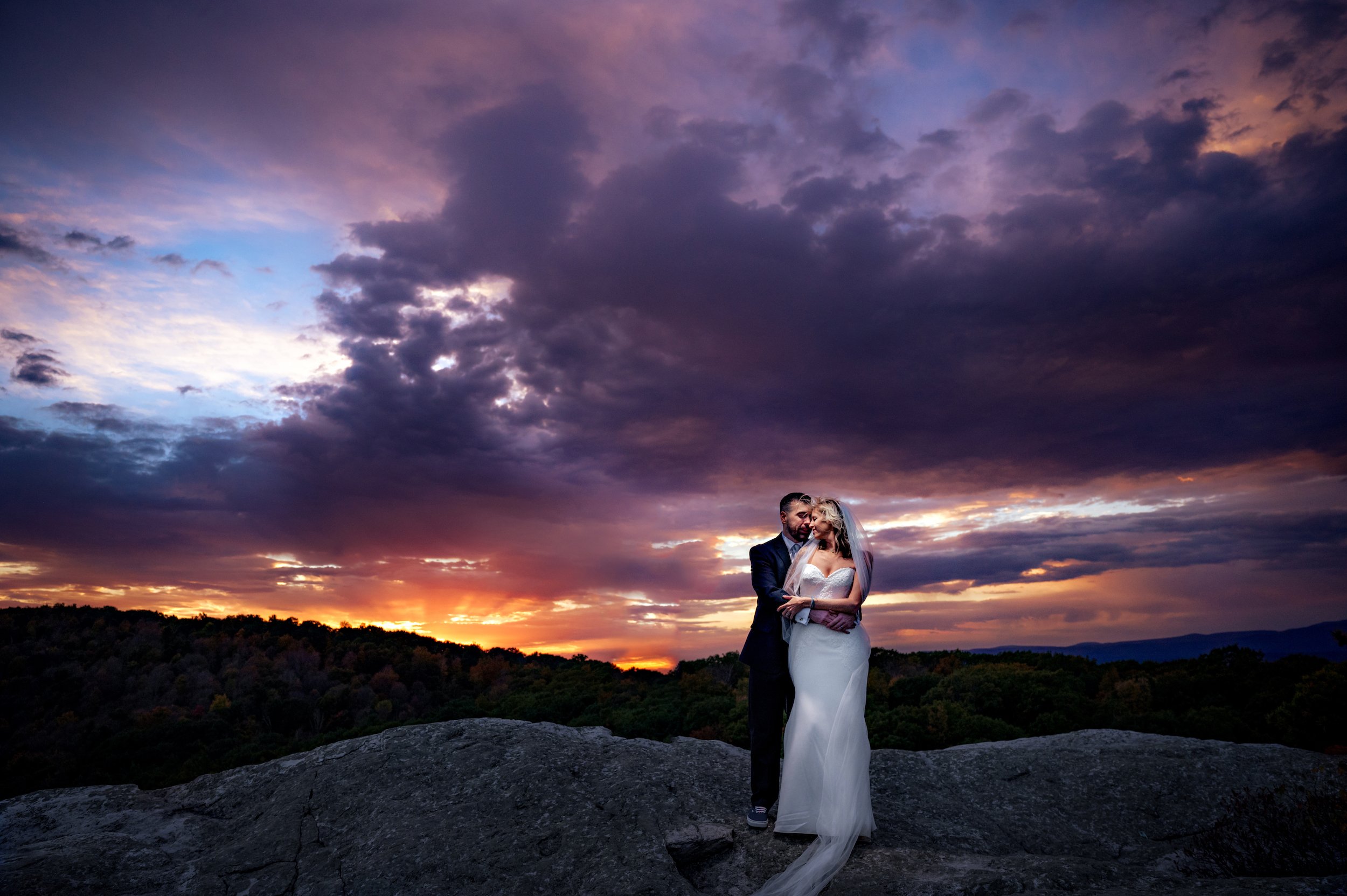 Jeff_Tisman_Photography_Jill_and_Mike_Vow_Renewal_16_Bride_and_Groom_Pose_on_Shawangunk_Mountain_Sunset.jpg
