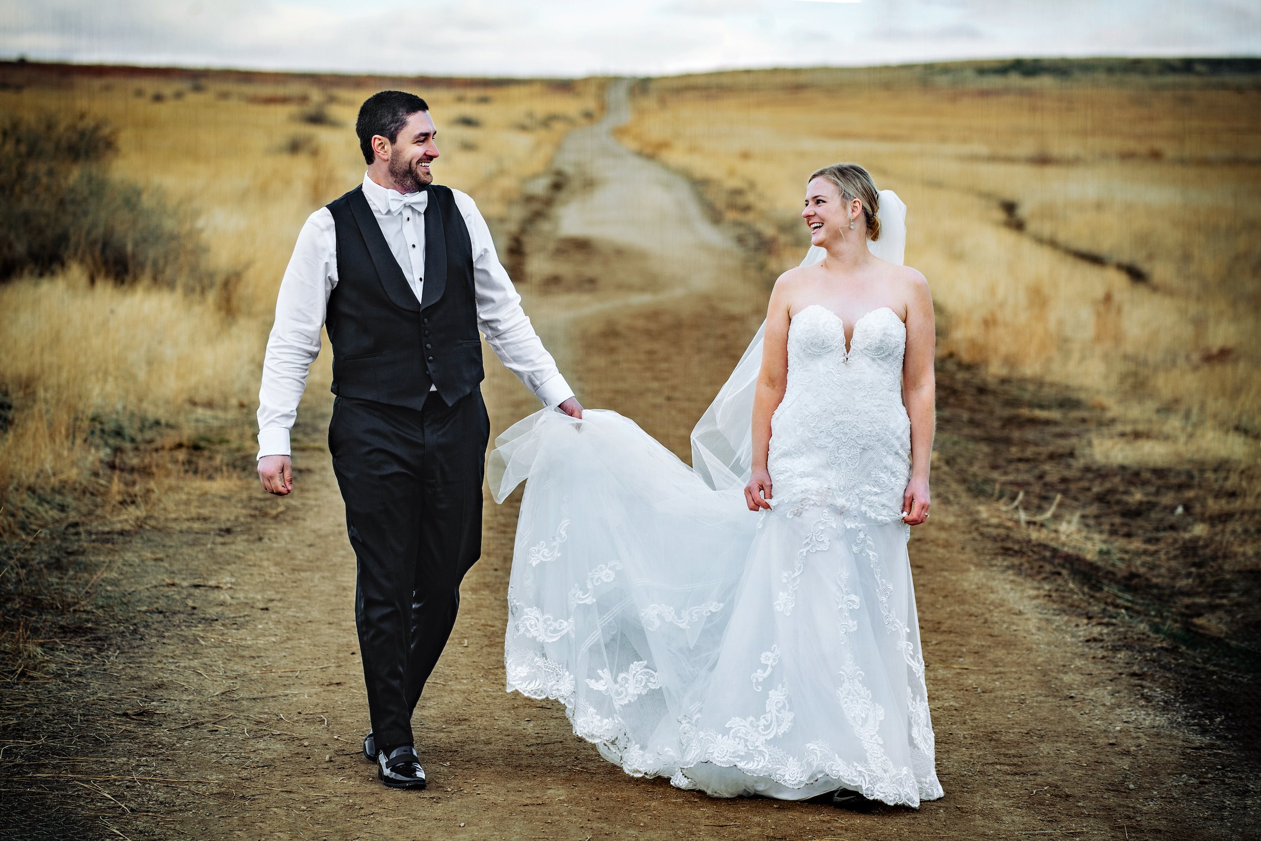 Jeff_Tisman_Wedding_Photography_Hunter_Sydney_Boulder_Colorado_Couple_Walks_on_Dirt_Path.jpg