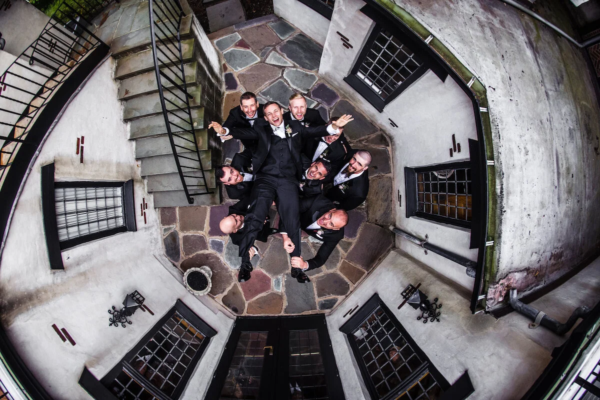 View from above of groomsmen in Chateau castle