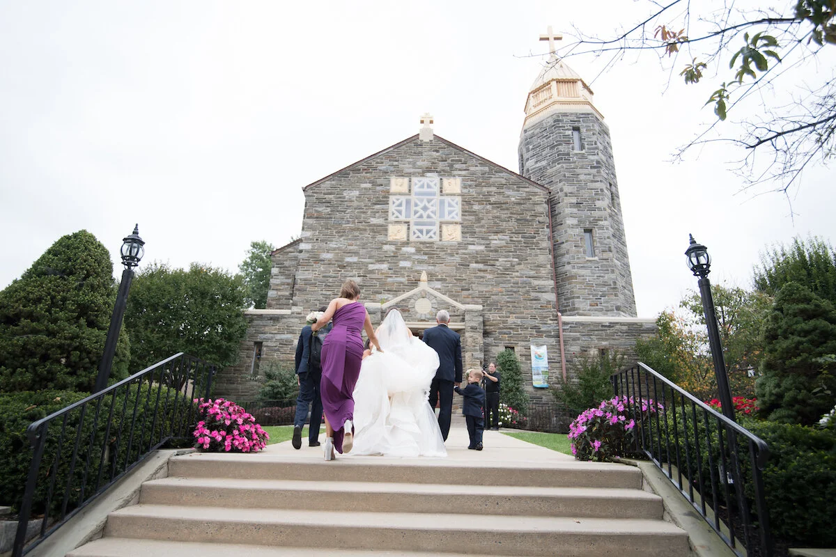 Bride walking toward church