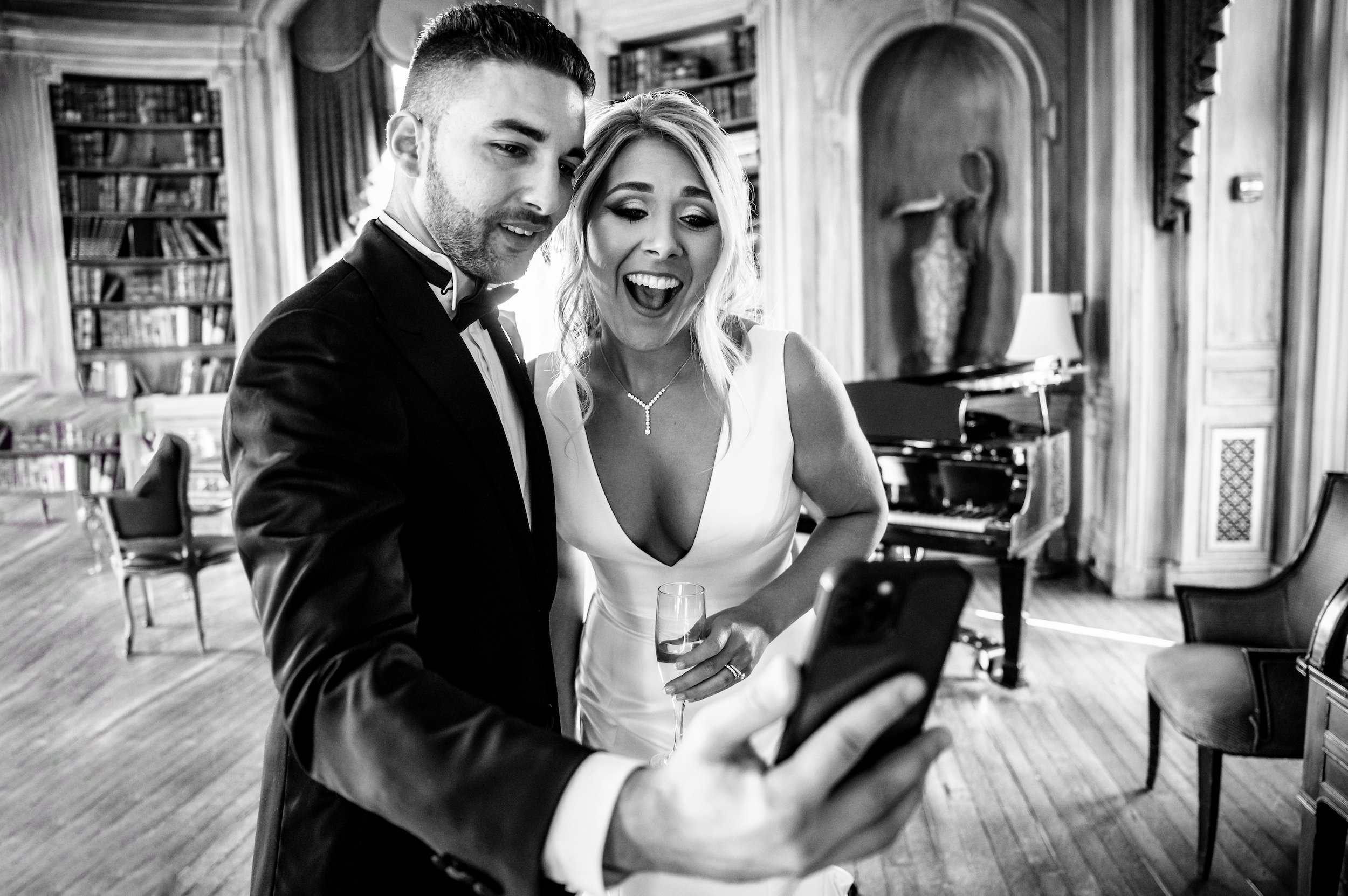 Bride and groom video call with family member