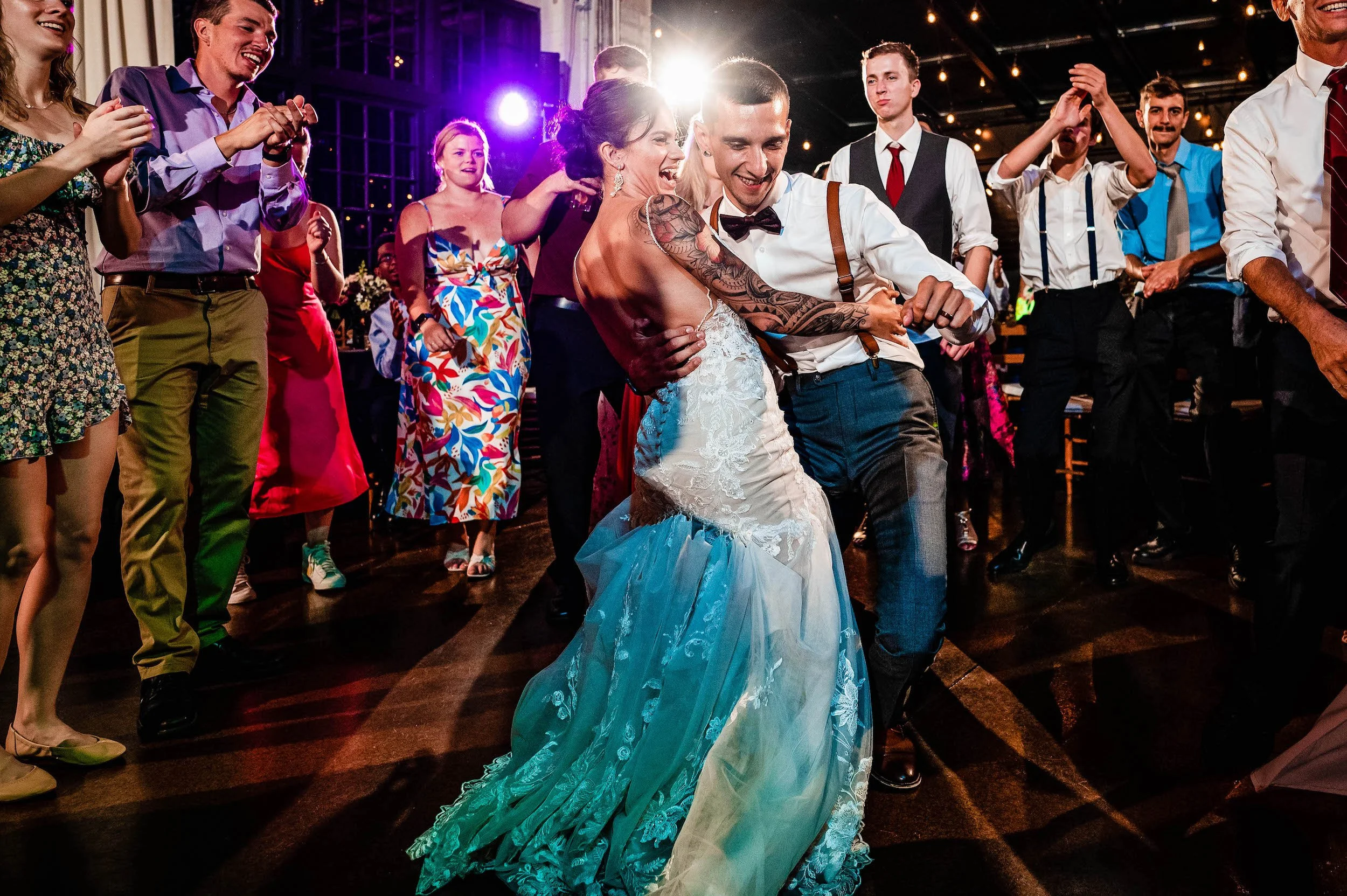 Bride and groom dance at end of night
