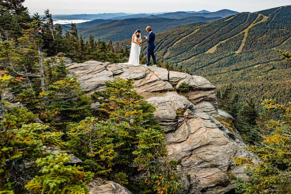 Bride and groom share vows on mountain top