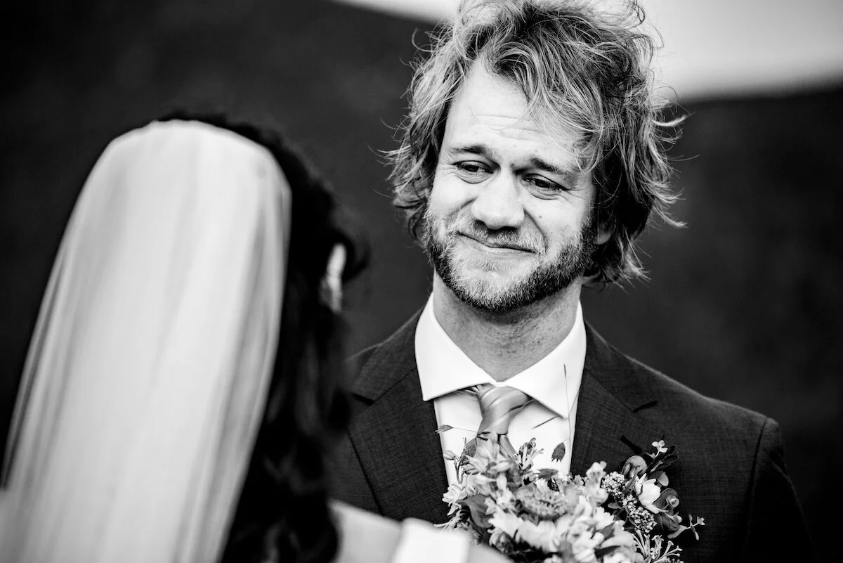 Groom tears up while bride says vows