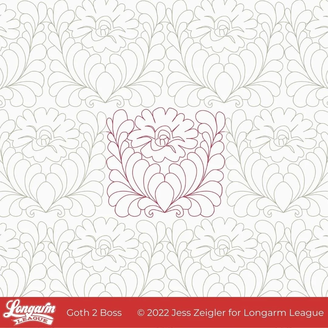 A pattern of floral designs with one portion outlined in burgundy color.