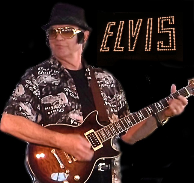James performing Elvis Presley with a guitar, wearing sunglasses, a hat, and a patterned shirt, with a sign reading 'ELVIS' in the background.