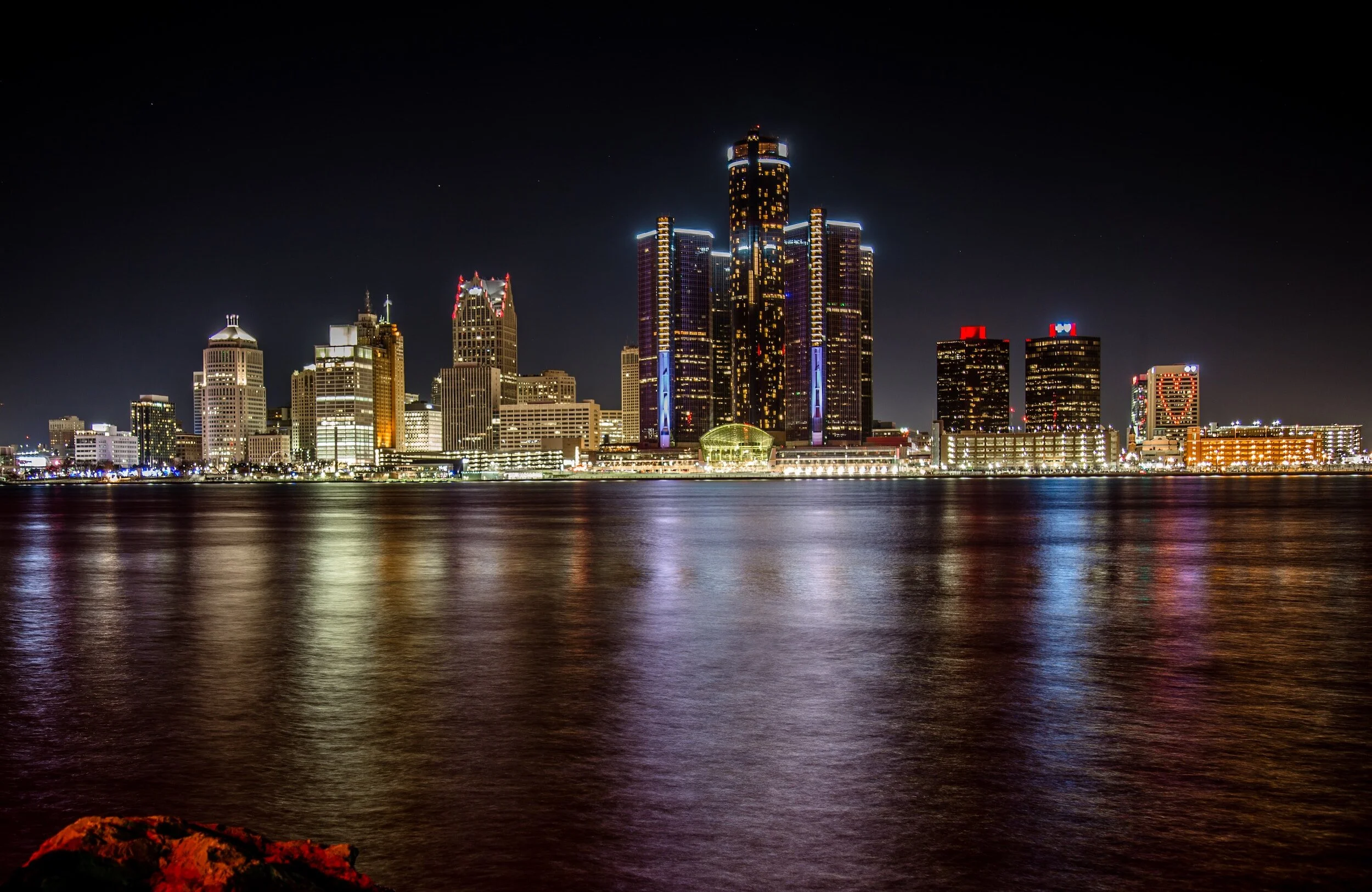 A city skyline in Michigan at night.