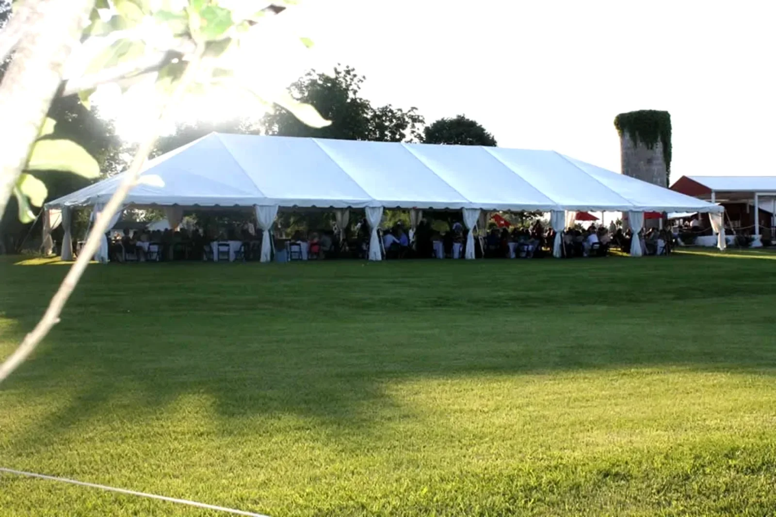 40x100 spacious outdoor wedding tent with guest seating in DuPage County