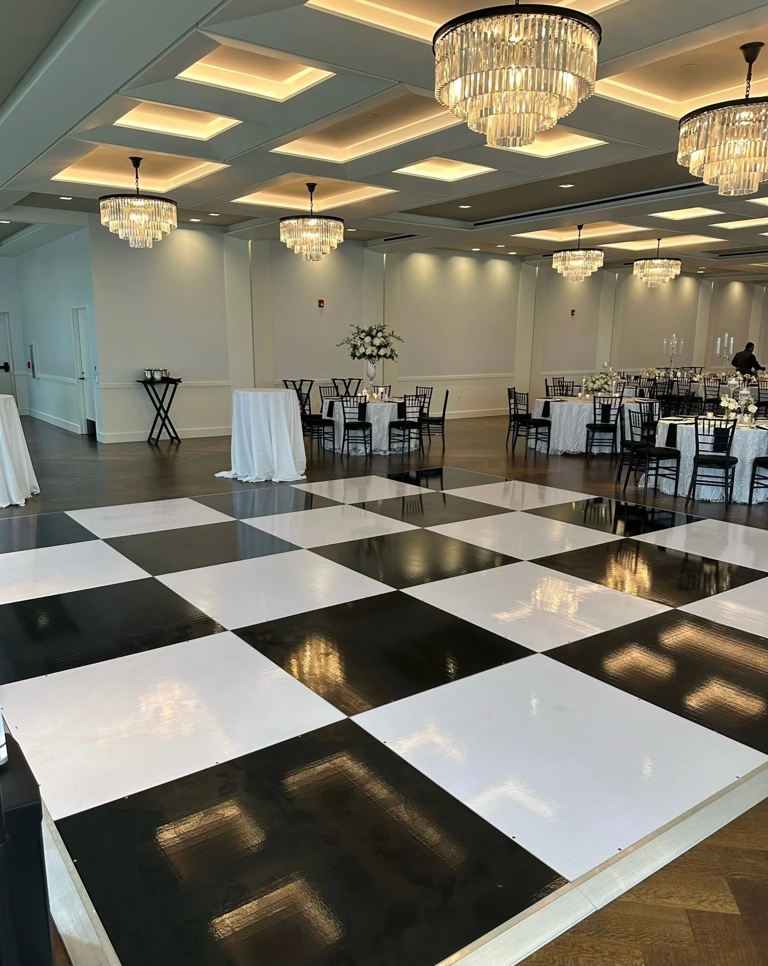Black and white checkerboard dance floor rental for weddings in Chicagoland