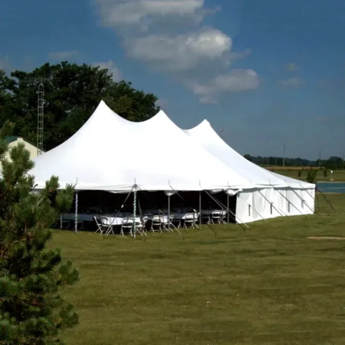 40x80 pole tent with reception dining layout for outdoor wedding