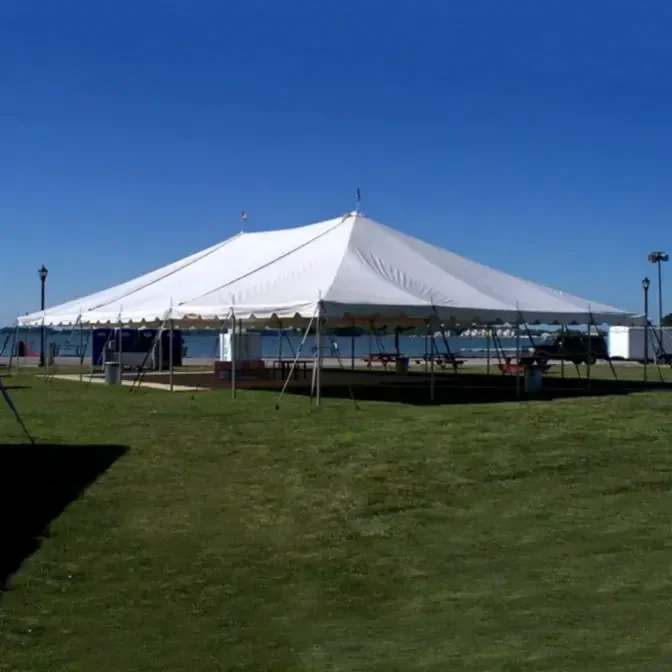 40x60 pole tent installed near waterfront wedding venue