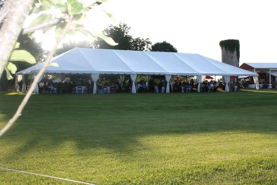 40x100 commercial tent rental installed for large outdoor function