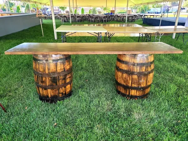 wedding tent installation with rustic bars in Lombard IL