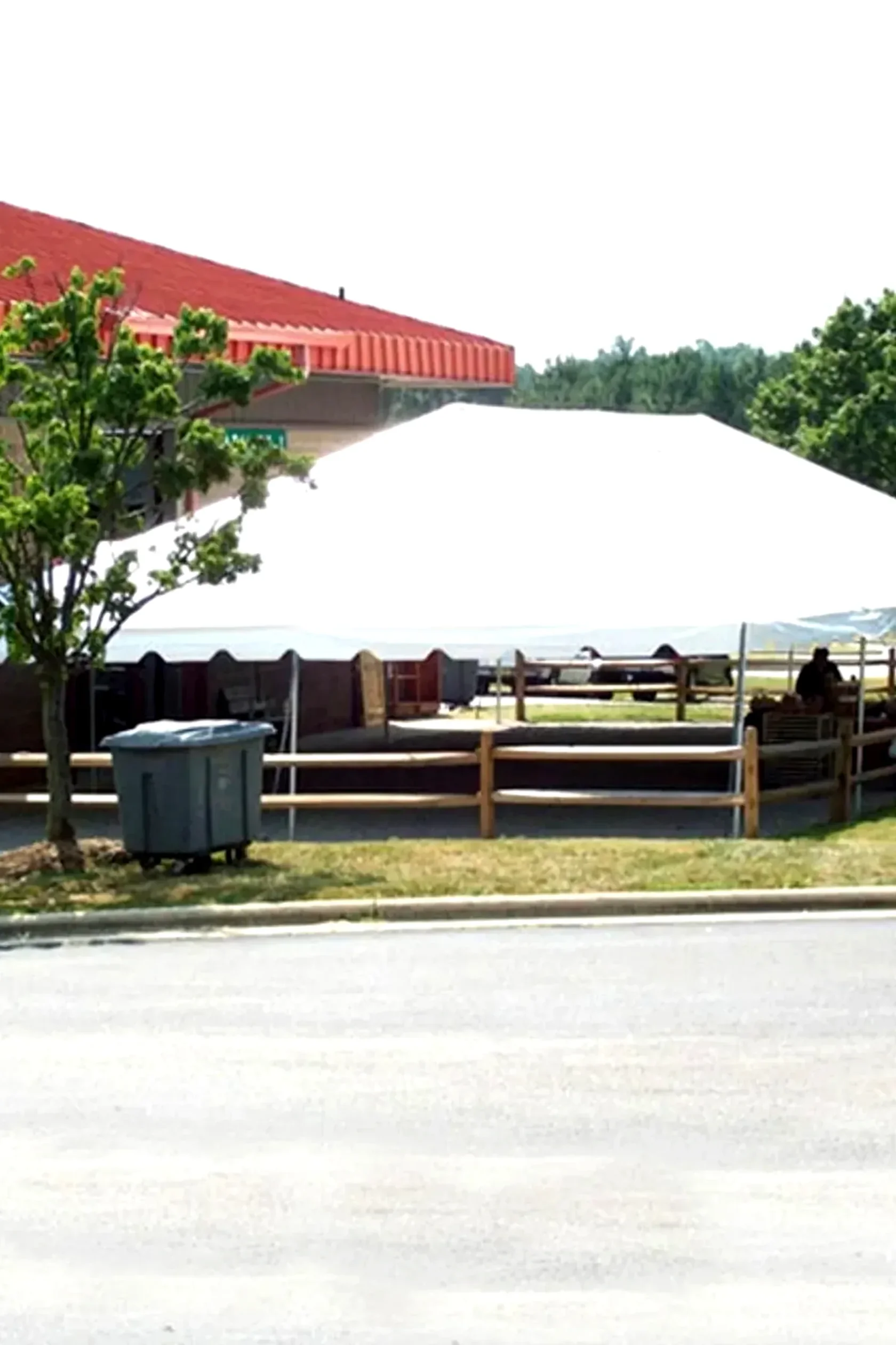 30x75 reception tent with banquet table layout for Illinois wedding