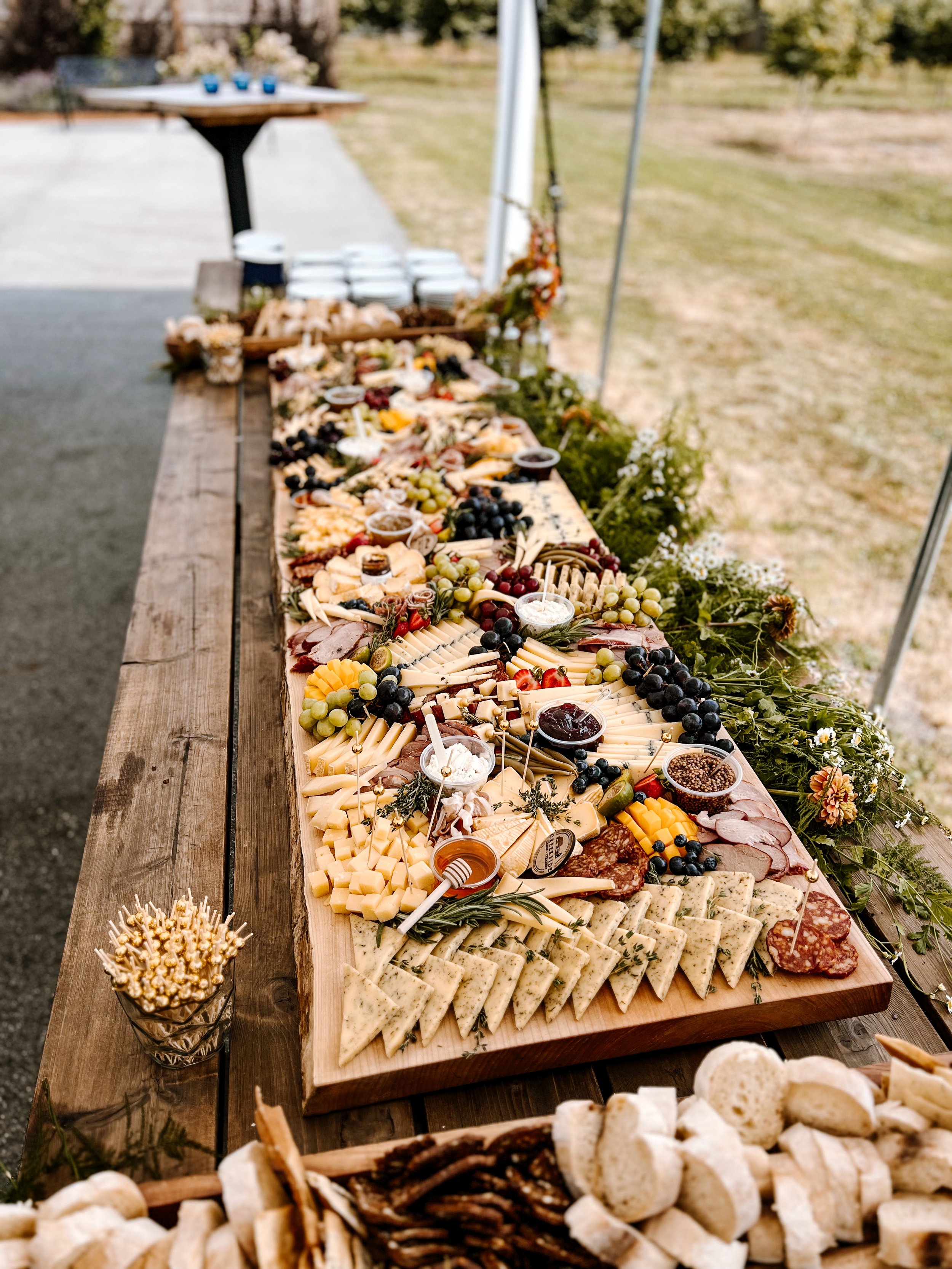   This year we branched out into large format cheese and charcuterie grazing boards, with spreads for 100 guest weddings. These turned out SO beautiful! Getting married in 2024? Reach out for a quote ! 