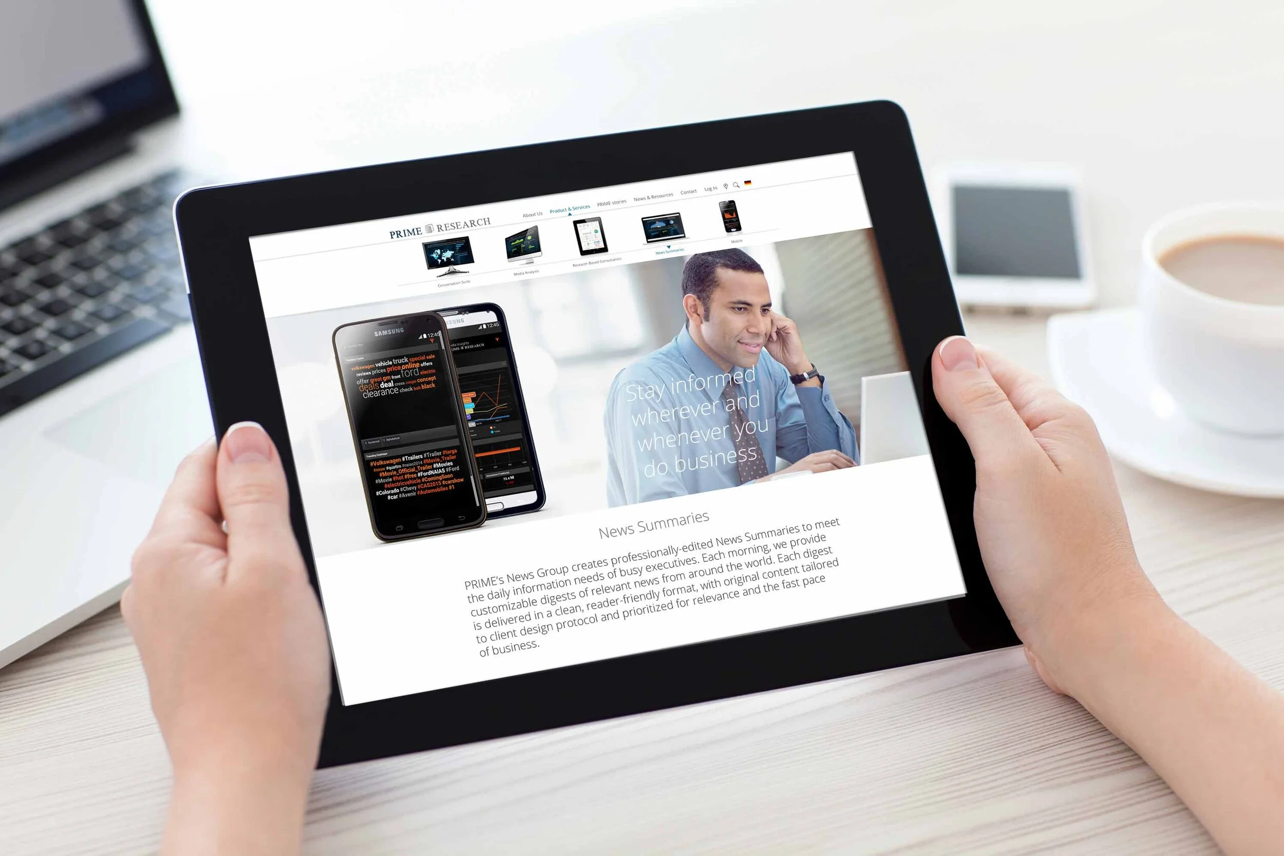 Person holding a Tablet - Prime Research website pages- PR monitoring application landing pagepage