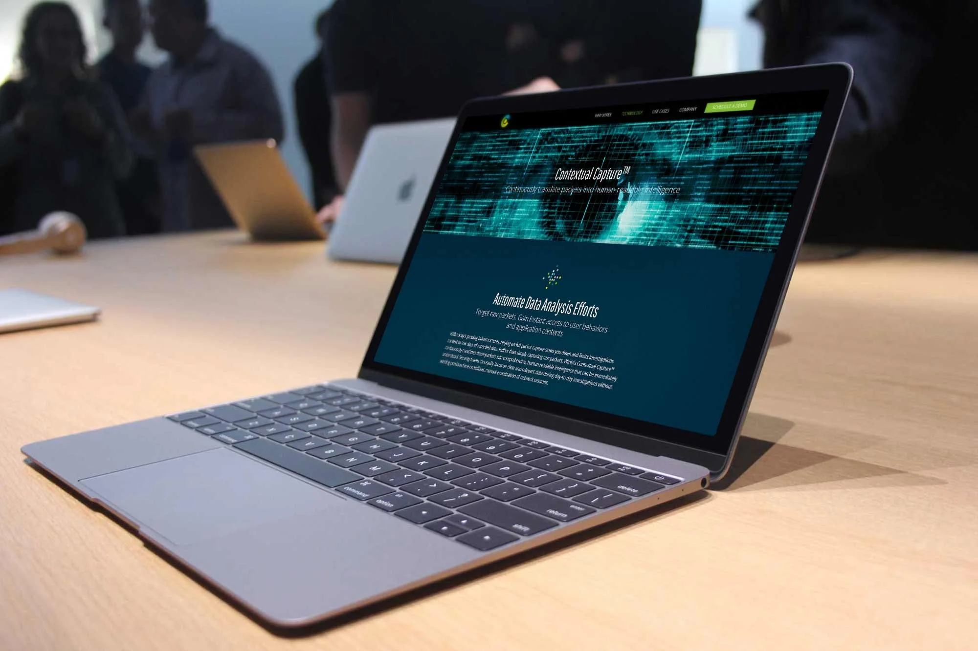 WireX Systems website presented in a a laptop on a table.