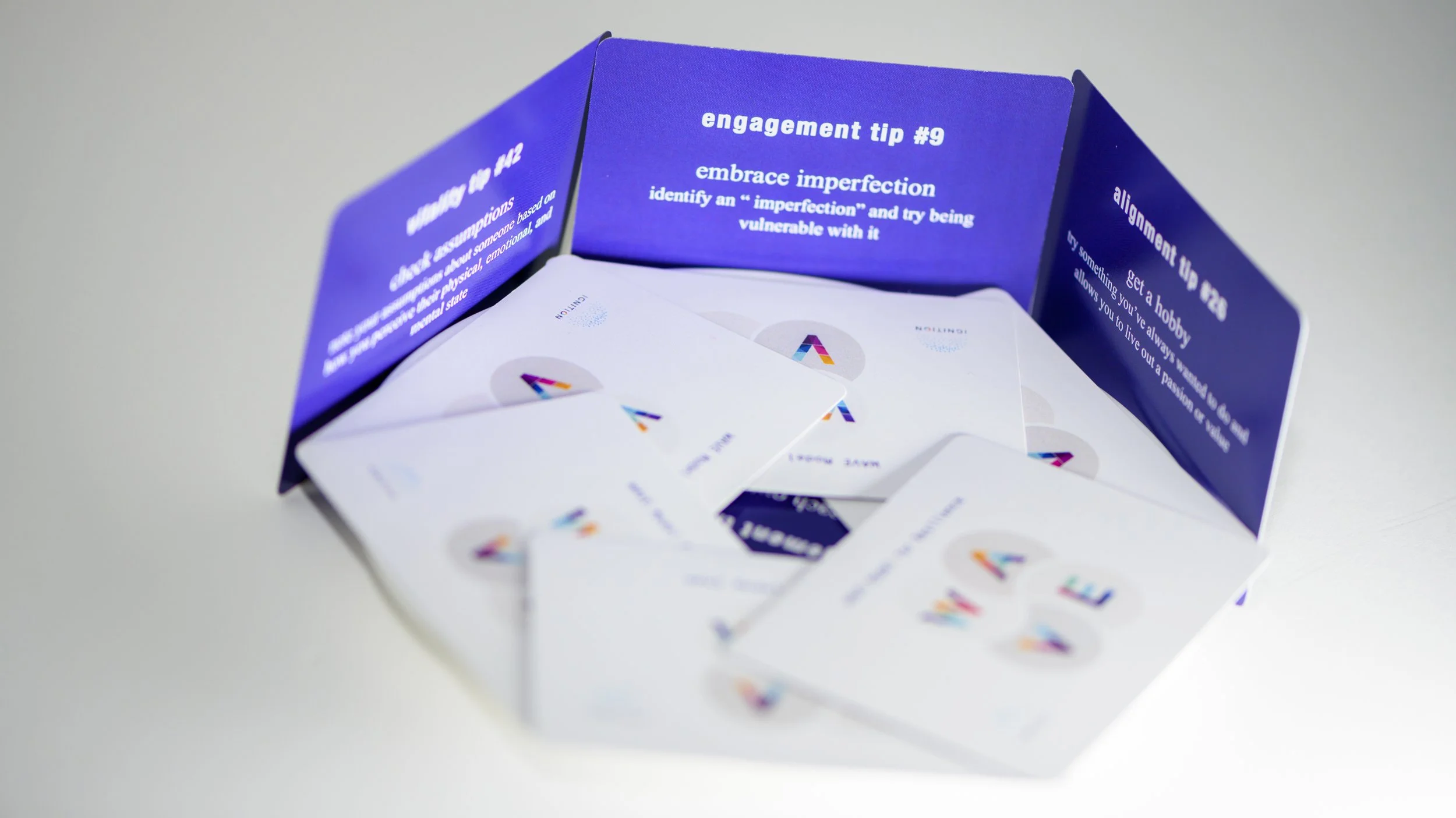 Ignition coaching cards on a white serface.