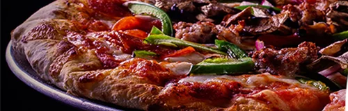 Unlimited pizza, salad, and soda catering package