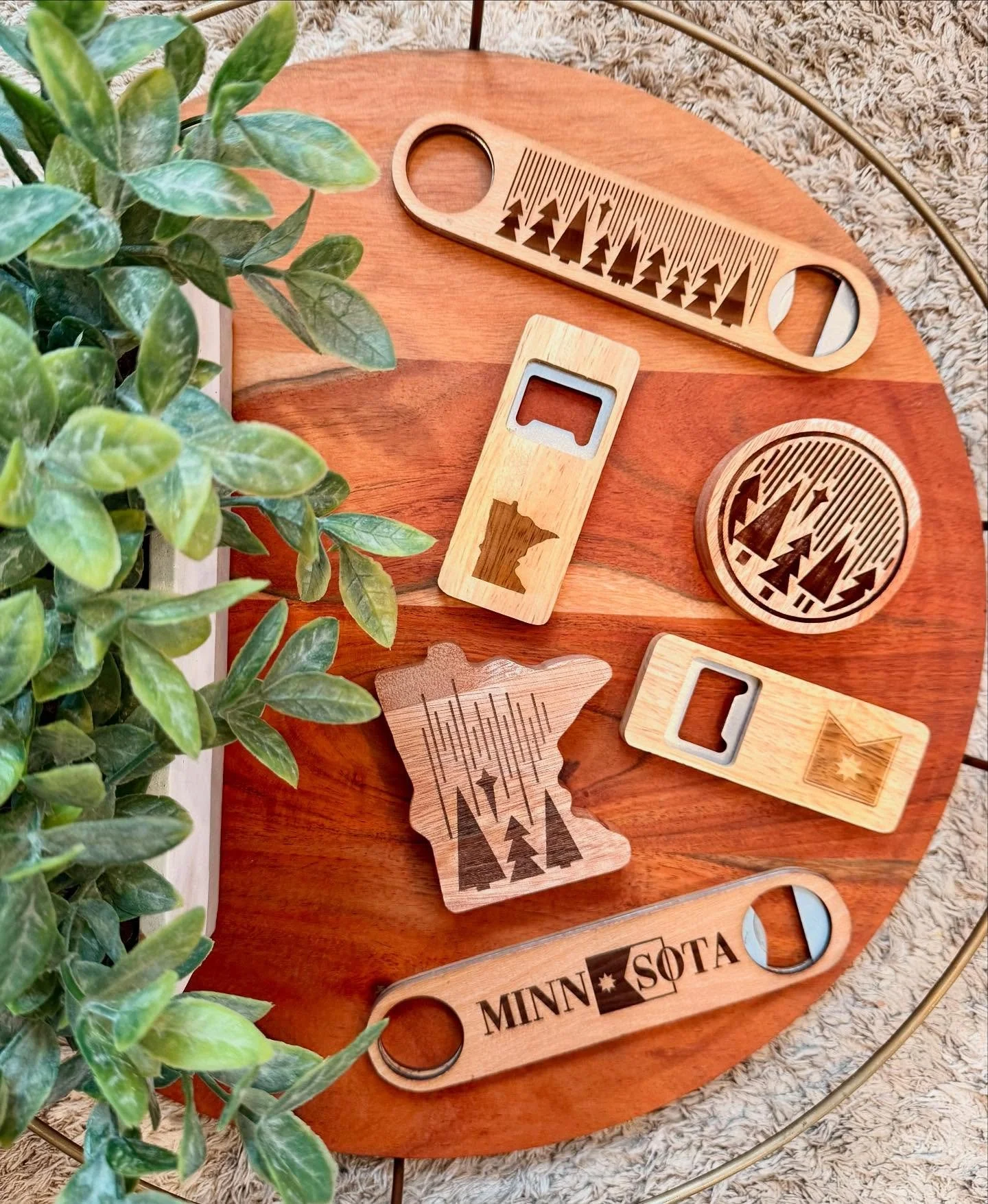 A selection of gorgeous bottle openers! 
.
.
.
. 
#shopsmall #shoplocal #mnmade 
#minnesotamaker #northernlightsdesign #smallbusiness #lasercut #mnlove #xTool #xToolmade #woodworking #makersmarket #bottleopener