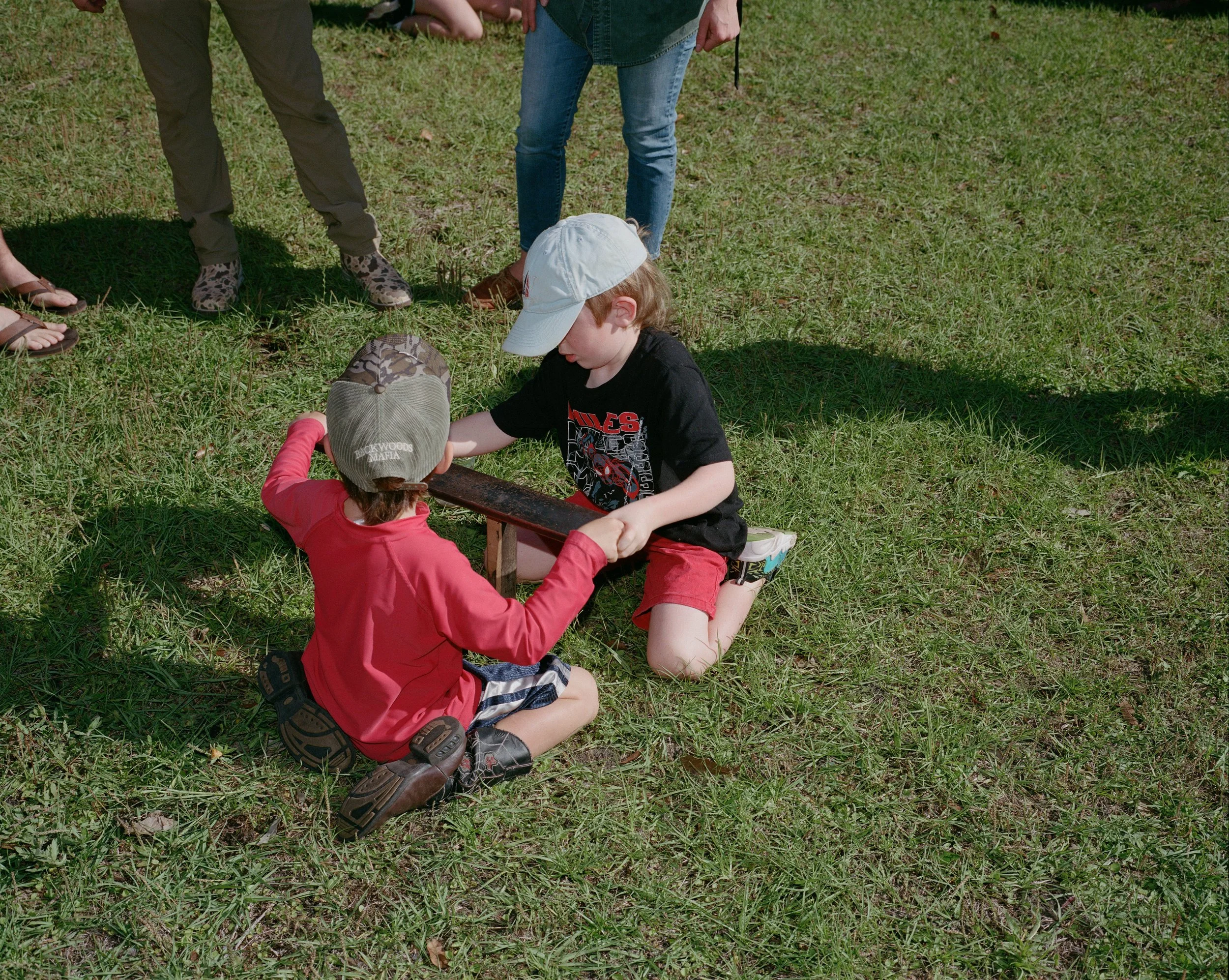 Two Kids Work Together