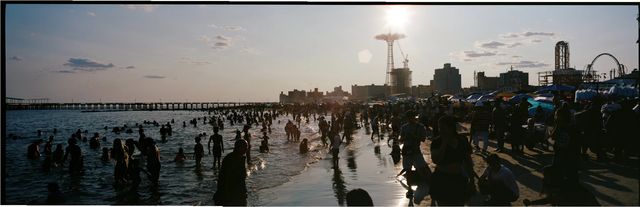 Bathers and crowds on the beach, Coney Island
