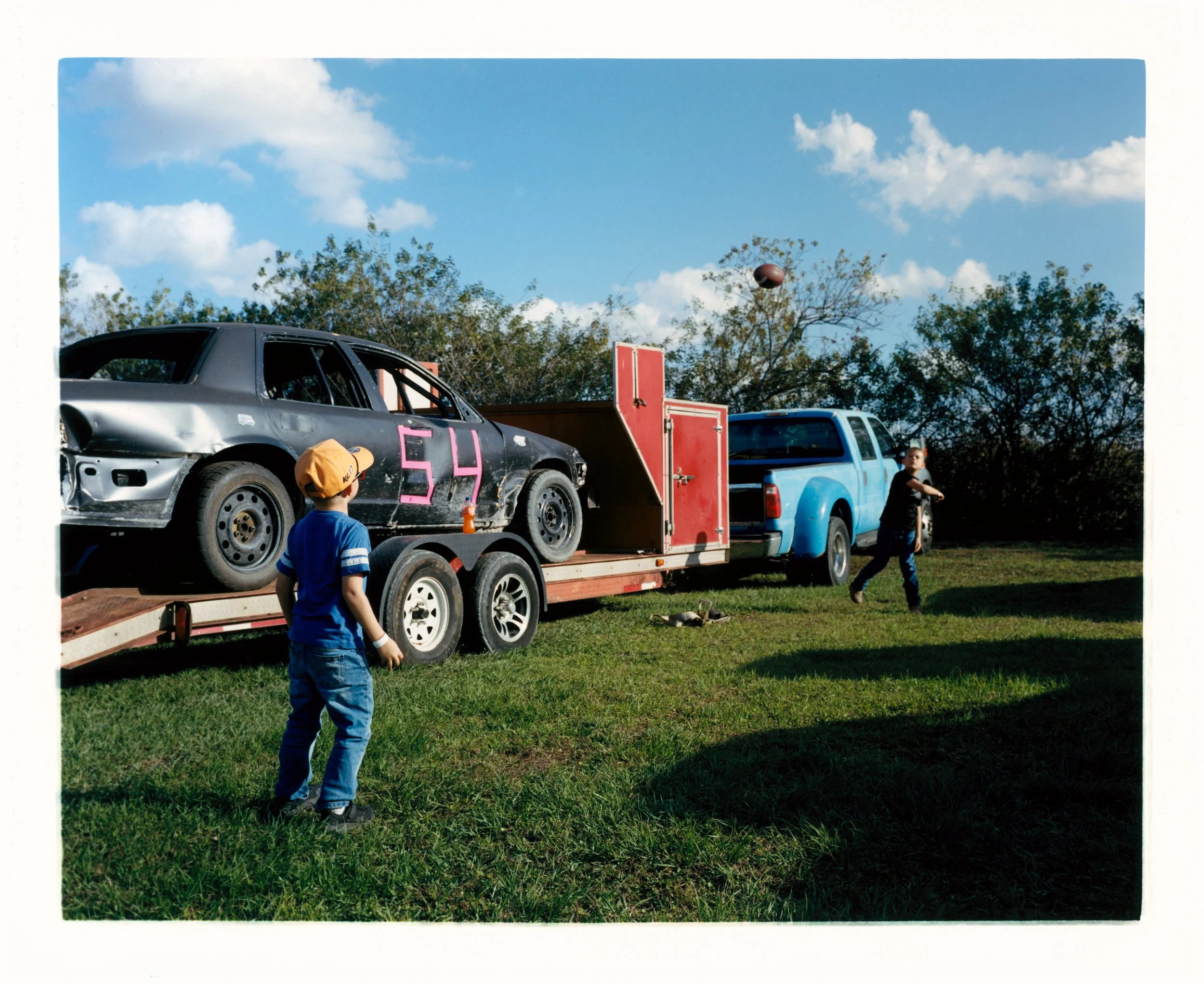 Kids Throwing A Football Before The Derby.jpg