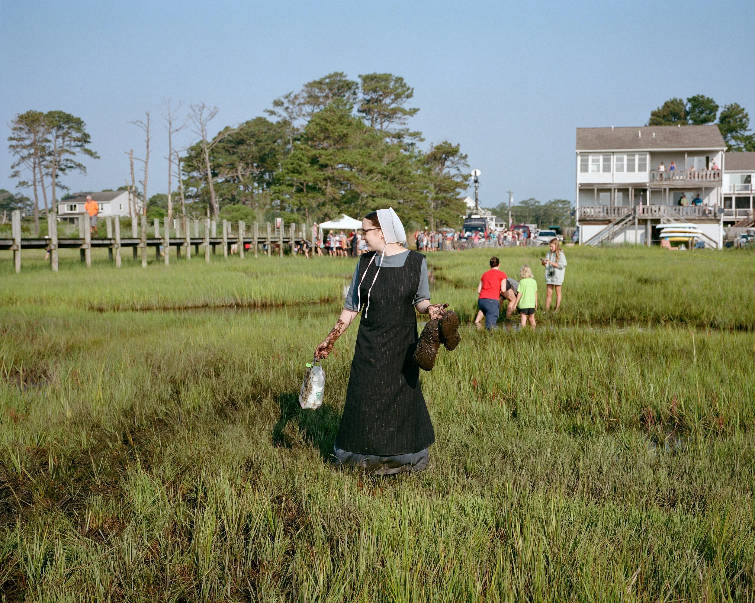 Amish Woman In The Mud